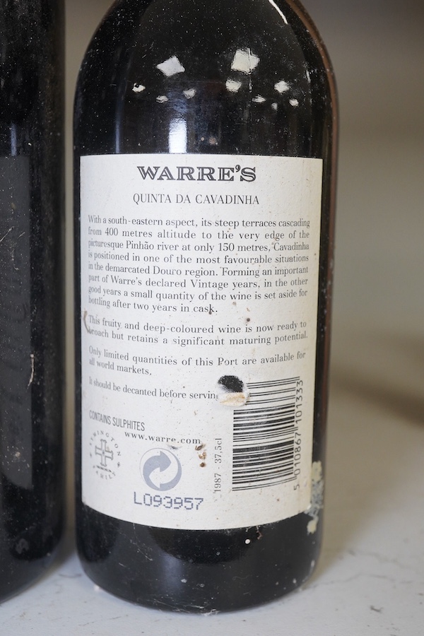 Five bottles of port to include three bottles of Warre’s 1975 (no label), a bottle of C. Da Silvas Vintage 1982 port and a 37.5cl bottle of Warres 1987 Quinta Da Cavadinha. Condition - fair to good, three bottles without